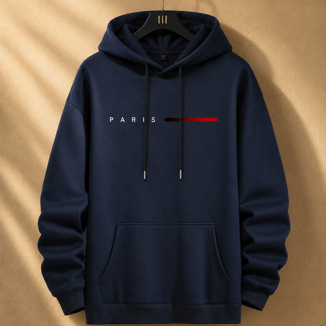 Navy blue hoodie with 'PARIS' text and red line on a beige background