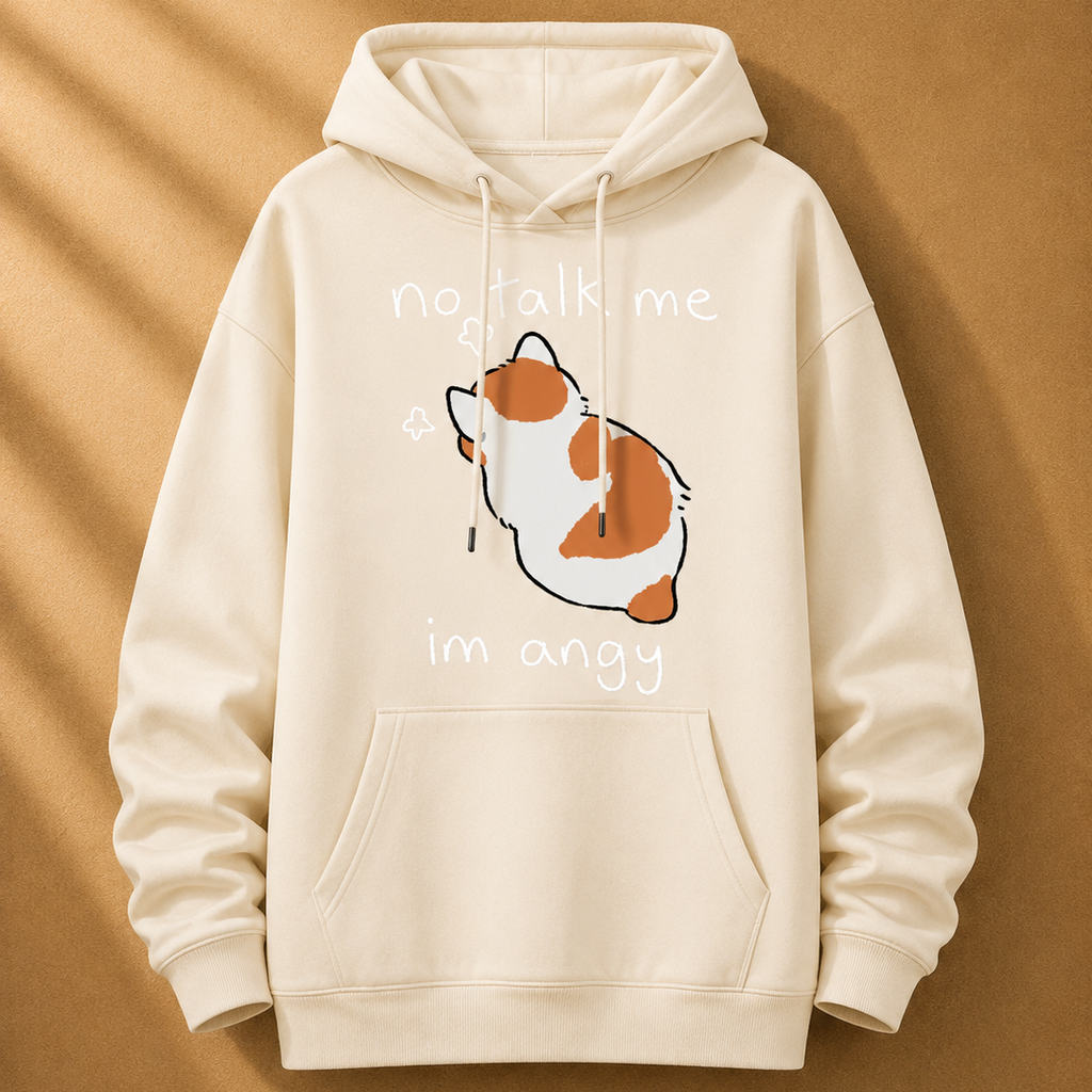Beige hoodie with a cartoon cat and text on a brown background